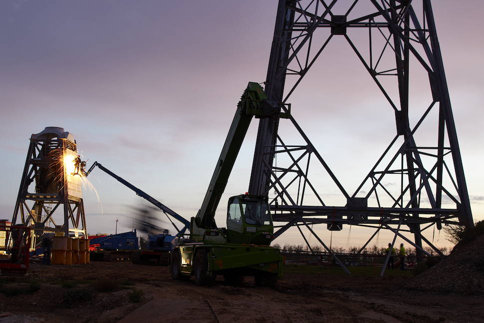 Machine house erected with built-in machine mounts